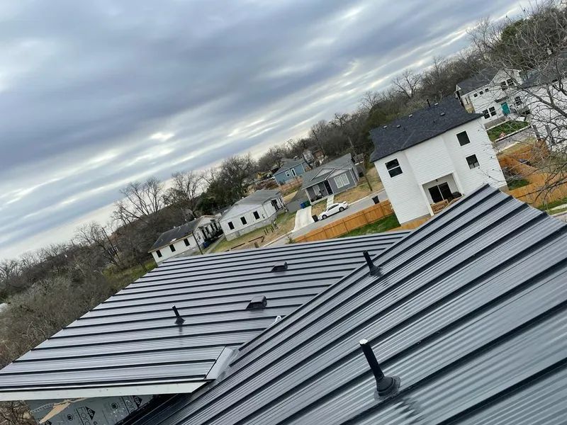 Standing seam metal roof panels with vents for Skylight Repair in Bayville
